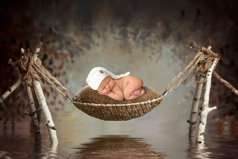 Composite photograph of a newborn baby boy by Dallas/Fort Worth newborn photographer Chaunva LeCompte Photography